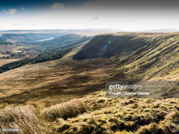 view to upper neuadd reservoir from graig fan ddu. image from a circular walk taking in the peaks of corn du and pen y fan in the brecon beacons national park, south wales, uk. january - pen y fan stock pictures, royalty-free photos & images