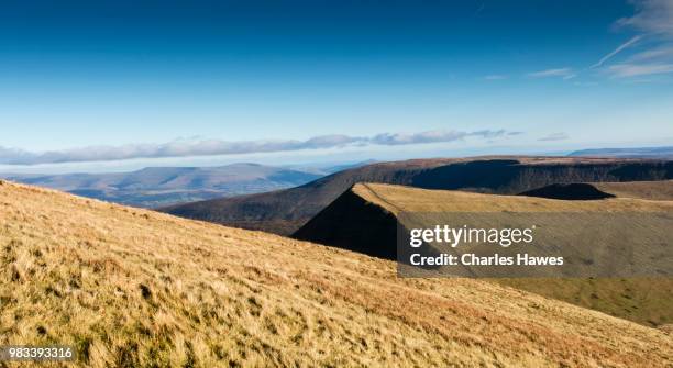 view from pen y fan to cribyn. image from a circular walk taking in the peaks of corn du and pen y fan in the brecon beacons national park, south wales, uk. january - pen y fan stock pictures, royalty-free photos & images