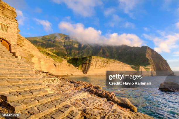 pollara at sunset on salina, the second largest island in the aeolian islands (sicily, italy) - aeolian islands stock pictures, royalty-free photos & images