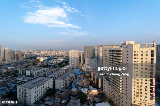 Low rise shanty area among the new high buildings in downtown. As the starting point of the Silk Road, Xi'an is one of the fast developing city in...