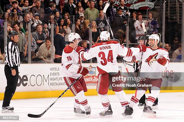 Shane Doan, Daniel Winnik and Adrian Aucoin of the Phoenix Coyotes celebrate after defeating the Los Angeles Kings on April 8, 2010 at Staples Center...