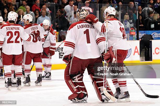 Shane Doan of the Phoenix Coyotes congratulates teammate Jason LaBarbera after defeating the Los Angeles Kings on April 8, 2010 at Staples Center in...