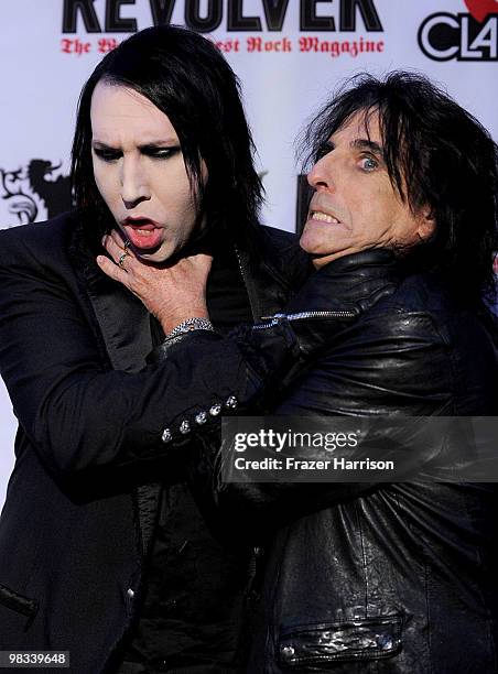 Musicians Marilyn Manson and Alice Cooper arrive at the 2nd annual Revolver Golden Gods Awards held at Club Nokia on April 8, 2010 in Los Angeles,...