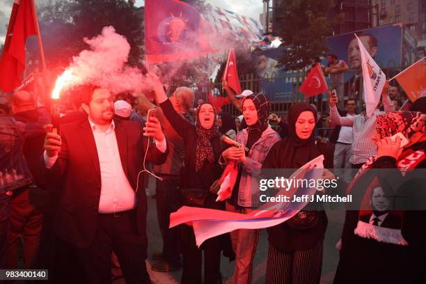 Erdogan's supporters celebrate outside the AK party headquarters on June 24, 2018 in Istanbul, Turkey. Turkey's President Recep Tayyip Erdogan has...