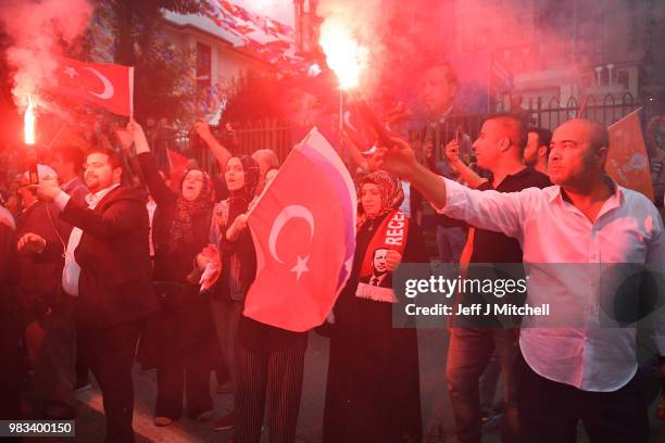 Erdogan's supporters celebrate outside the AK party headquarters on June 24, 2018 in Istanbul, Turkey. Turkey's President Recep Tayyip Erdogan has...