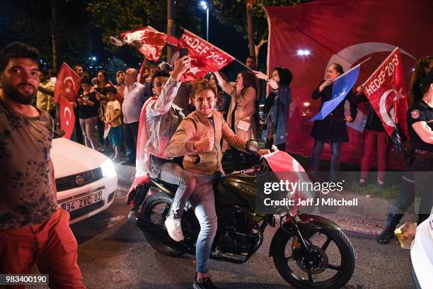 Erdogan's supporters celebrate outside the AK party headquarters on June 24, 2018 in Istanbul, Turkey. Turkey's President Recep Tayyip Erdogan has...