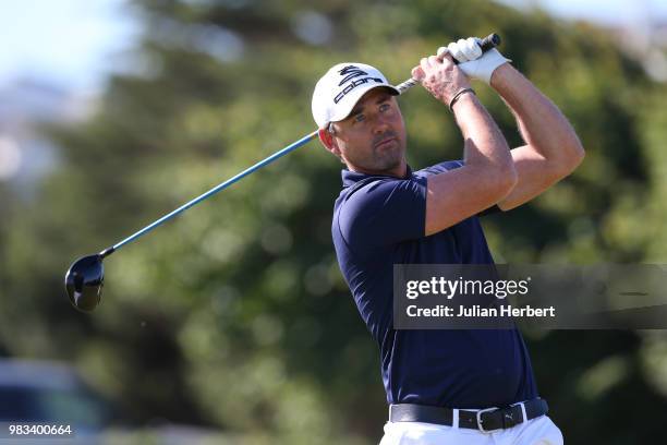 Mark Govier of Machynys Peninsula Golf Club plays his first shot on the 1st tee during The Lombard Trophy South West Qualifier at Royal North Devon...