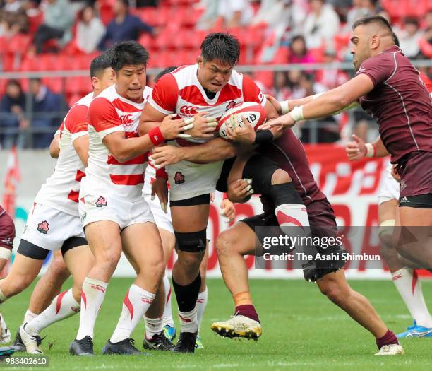 Kazuki Himeno of Japan runs with the ball during the rugby international match between Japan and Georgia at Toyota Stadium on June 23, 2018 in...