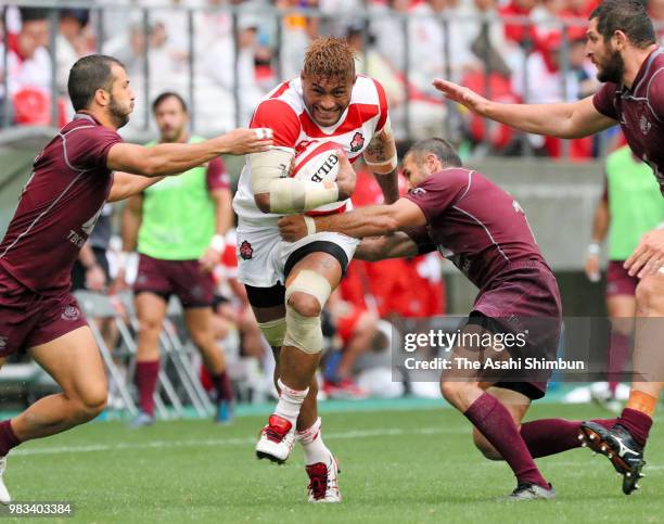 Amanaki Lelei Mafi of Japan runs with the ball during the rugby international match between Japan and Georgia at Toyota Stadium on June 23, 2018 in...