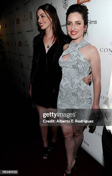 Actress Anne Hathaway and actress Zoe Lister-Jones arrive at the Los Angeles premiere of IFC's "Breaking Upwards" at the Silent Movie Theater on...