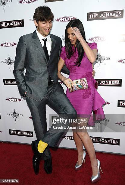 Actor Ashton Kutcher and actress Demi Moore attend the premiere of "The Joneses" at ArcLight Cinemas on April 8, 2010 in Hollywood, California.