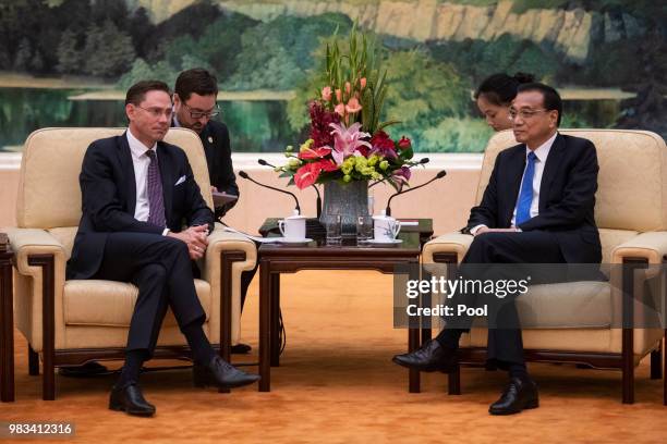 European Commission Vice President Jyrki Katainen meets with China's Premier Li Keqiang at the Great Hall of the People on June 25, 2018.