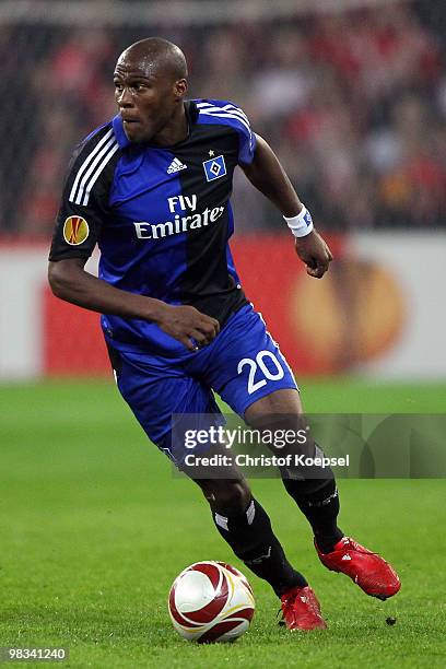 Guy Demel of Hamburg runs with the ball during the UEFA Europa League quarter final second leg match between Standard Liege and Hamburger SV at...