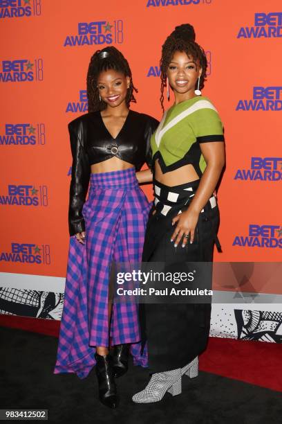 Halle Bailey and Chloe Bailey of Chloe X Halle poses for photos in the press poom at the 2018 BET Awards at Microsoft Theater on June 24, 2018 in Los...