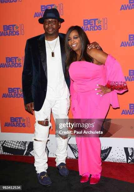 Singer Bobby Brown and Actress Sandi McCree pose for photos in the press poom at the 2018 BET Awards at Microsoft Theater on June 24, 2018 in Los...