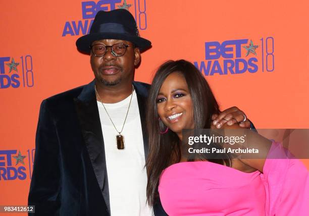 Singer Bobby Brown and Actress Sandi McCree pose for photos in the press poom at the 2018 BET Awards at Microsoft Theater on June 24, 2018 in Los...