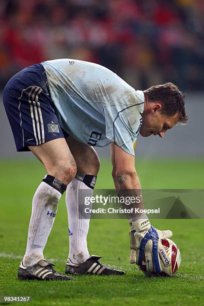 Frank Rost of Hamburg lays down the ball during the UEFA Europa League quarter final second leg match between Standard Liege and Hamburger SV at...