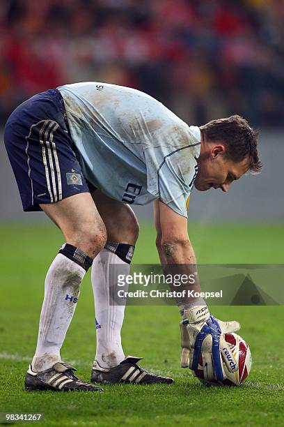 Frank Rost of Hamburg lays down the ball during the UEFA Europa League quarter final second leg match between Standard Liege and Hamburger SV at...