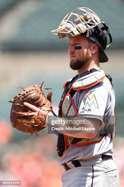 Bryan Holaday of the Miami Marlins looks on during a baseball game against the Baltimore Orioles at Oriole Park at Camden Yards on June 17, 2018 in...