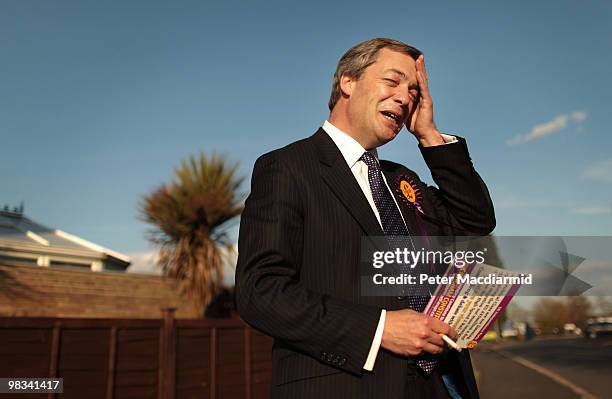 United Kingdom Independence Party member Nigel Farage rubs his head as he campaigns on April 8, 2010 in Winslow, England. UKIP Member of the European...