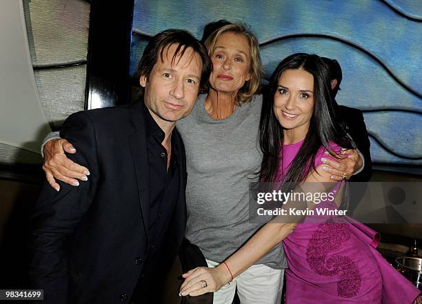 Actors David Duchovny, Lauren Hutton and Demi Moore pose at the afterparty for the premiere of Roadside Attractions and Echo Lake Entertainment's...