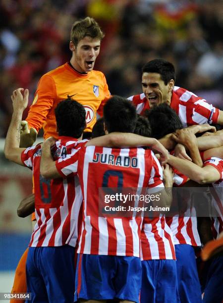 Goalkeeper David De Gea of Atletico Madrid celebrates with his teammates at the end the UEFA Europa League quarter final second leg match between...