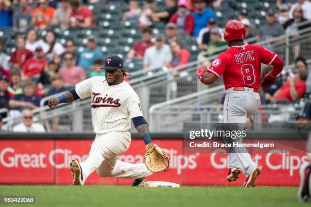 Miguel Sano of the Minnesota Twins fields against the Los Angeles Angels on June 9, 2018 at Target Field in Minneapolis, Minnesota. The Angels...