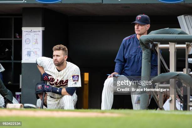 Brian Dozier of the Minnesota Twins and manager Paul Molitor look on against the Los Angeles Angels on June 9, 2018 at Target Field in Minneapolis,...
