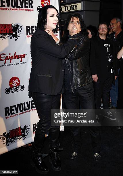 Musicians Marilyn Manson & Alice Cooper arrive at the 2nd annual Revolver Golden Gods Awards at Club Nokia on April 8, 2010 in Los Angeles,...