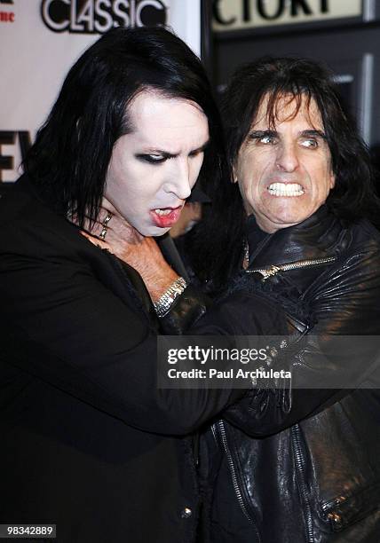 Musicians Marilyn Manson and Alice Cooper arrive at the 2nd annual Revolver Golden Gods Awards at Club Nokia on April 8, 2010 in Los Angeles,...