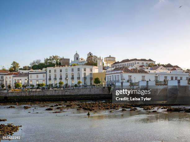 View of the castle from the Gilao River in Tavira, an 11th century Moorish- built town on the southern coast of Portugal.