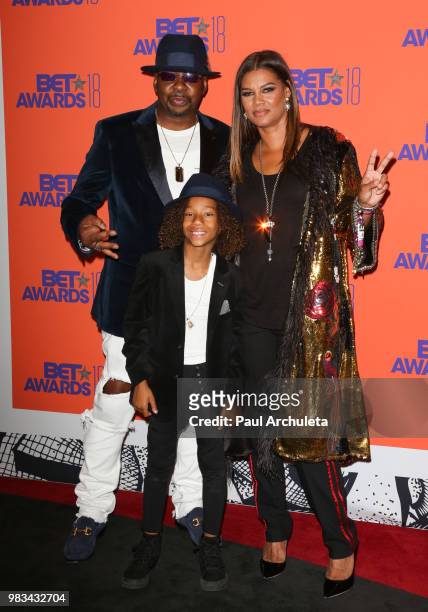 Bobby Brown, Cassius Brown and Alicia Etheredge pose for photos in the press poom at the 2018 BET Awards at Microsoft Theater on June 24, 2018 in Los...
