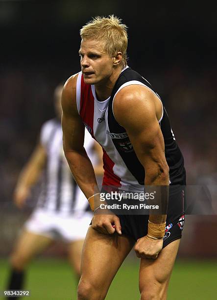 Nick Riewoldt of the Saints looks dejected after injuring his ankle during the round three AFL match between the St Kilda Saints and the Collingwood...