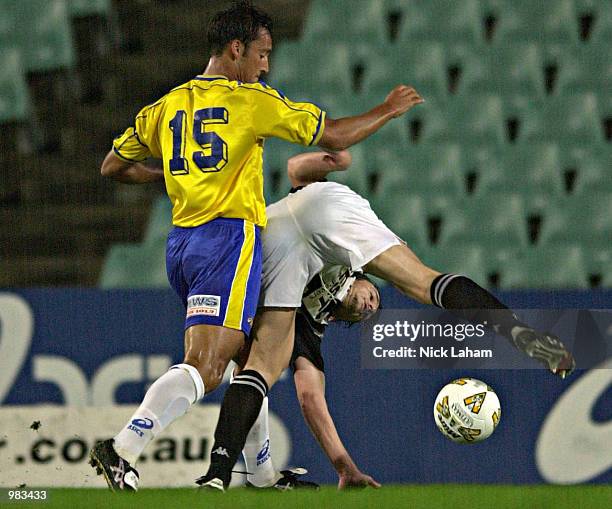 Michael Santalab of the Power and Gianluca Lagati of the Force compete for the ball during the round 28 NSL match between the Parramatta Power and...