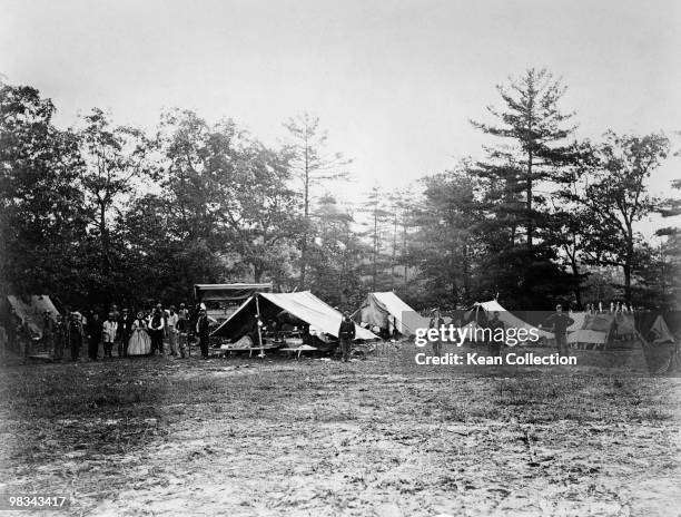 Wounded and staff at a field hospital at Getttysburg during the US Civil War, circa 1863.