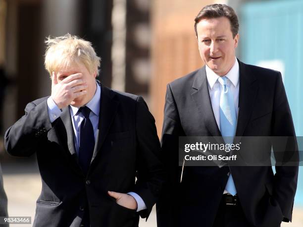 Boris Johnson , the Mayor of London, and David Cameron, the Conservative party leader, leave the Royal Hospital Chelsea after a visit to the home of...