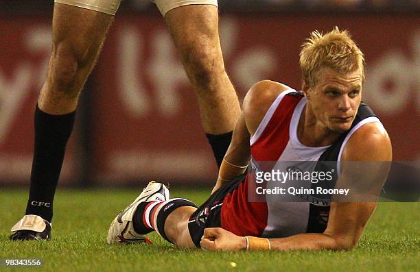 Nick Riewoldt of the Saints grabs his hamstring after injuring it during the round three AFL match between the St Kilda Saints and the Collingwood...