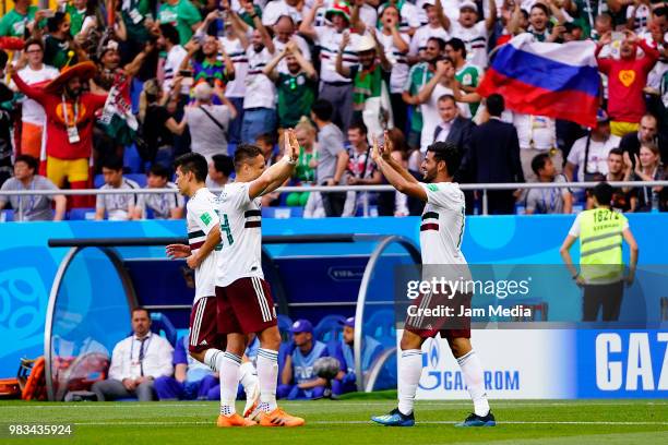 Carlos Vela of Mexico celebrates after scoring the opening goal via penalty with teammate Javier Hernandez during the 2018 FIFA World Cup Russia...