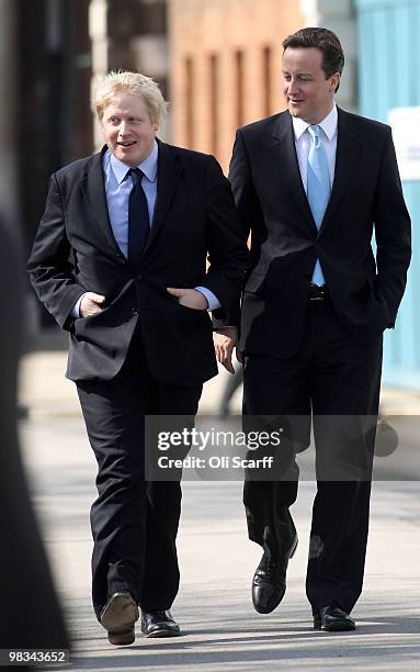 Boris Johnson , the Mayor of London, and David Cameron , the Conservative party leader, leave the Royal Hospital Chelsea after a visit to the home of...