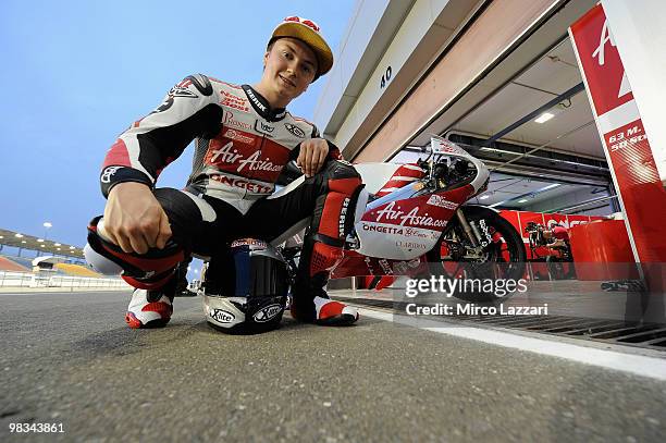 Sturia Fagerhaug of Norvey and Air Asia - Sepang Int. Circuit poses in front his bike during the first Grand Prix of the 2010 season at Losail...