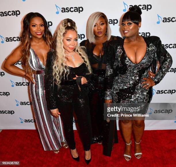 Kandi Burruss, Tameka 'Tiny' Harris, Tamika Scott, and LaTocha Scott attend the 31st Annual Rhythm and Soul Music Awards - Arrivals at the Beverly...