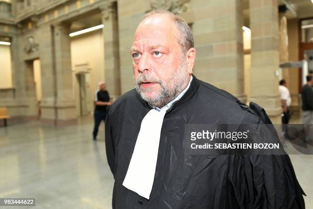 Eric Dupond-Moretti, the lawyer of Eric Mosser, accused of the alledged murder of his wife, arrives on June 25 at the Strasbourg' courthouse for the...