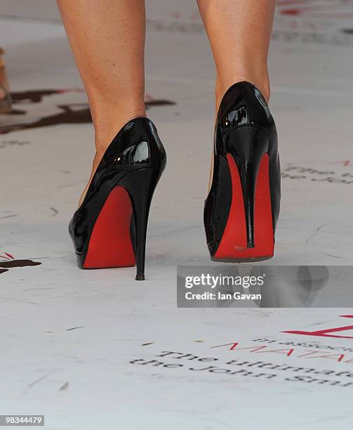 Coleen Rooney attends Ladies' Day at Aintree Racecourse on April 9, 2010 in Liverpool, England.