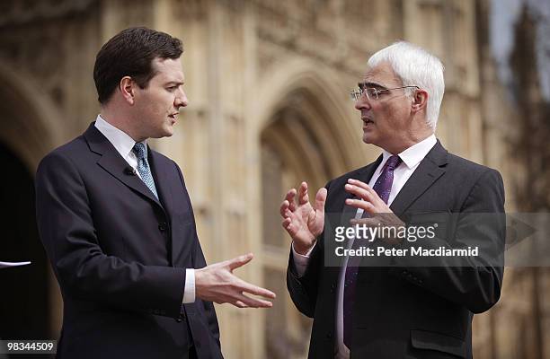 Chancellor of the Exchequer Alistair Darling debates with his Conservative shadow George Osborne in a BBC news television interview near Parliament...
