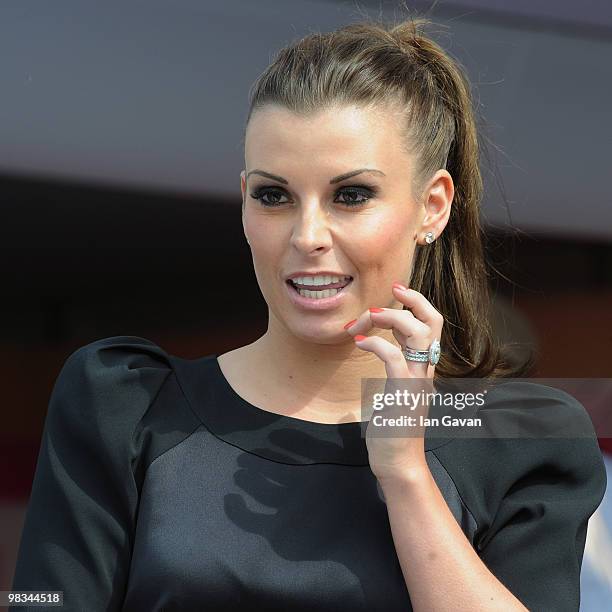 Coleen Rooney attends Ladies' Day at Aintree Racecourse on April 9, 2010 in Liverpool, England.