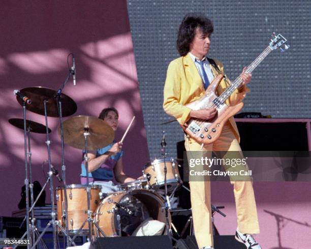 Charlie Watts and Bill Wyman performing with the Rolling Stones at Candlestick Park in San Francisco on October 17, 1981. Wyman plays a Travis Bean...