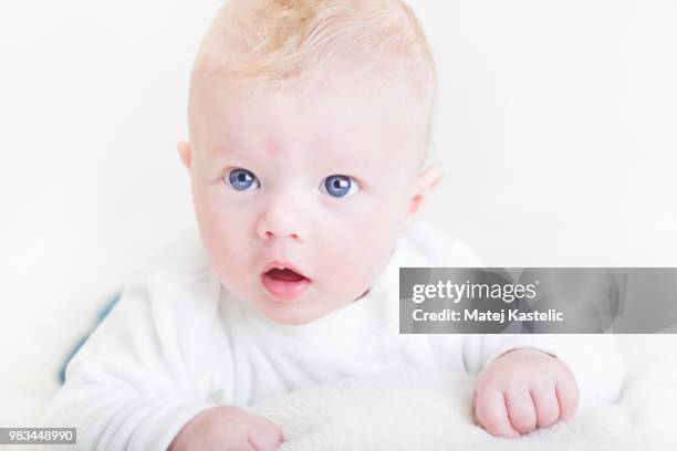 baby with blue eyes - baby blue eyes stock pictures, royalty-free photos & images