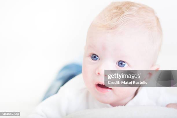 baby with blue eyes - baby blue eyes stock pictures, royalty-free photos & images