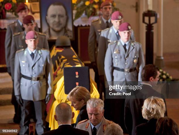 German chancellor Angela Merkel, General Volker Wieker, Chief of Staff of the German Bundeswehr, and German Defense Minister Karl-Theodor zu...