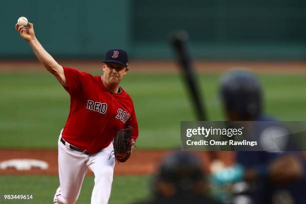 Steven Wright of the Boston Red Sox pitches at the top of the second inning of the game against the Seattle Mariners at Fenway Park on June 22, 2018...